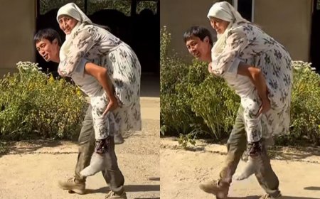 Анасын арқалаған Ердос Қанаевтың әрекеті елді тәнті етті (ВИДЕО)