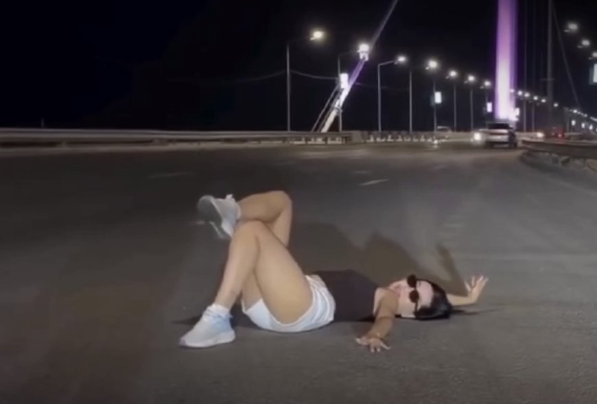 Семейде көпірдегі қауіпті жолға жатып суретке түскен  әйел айыппұл арқалады